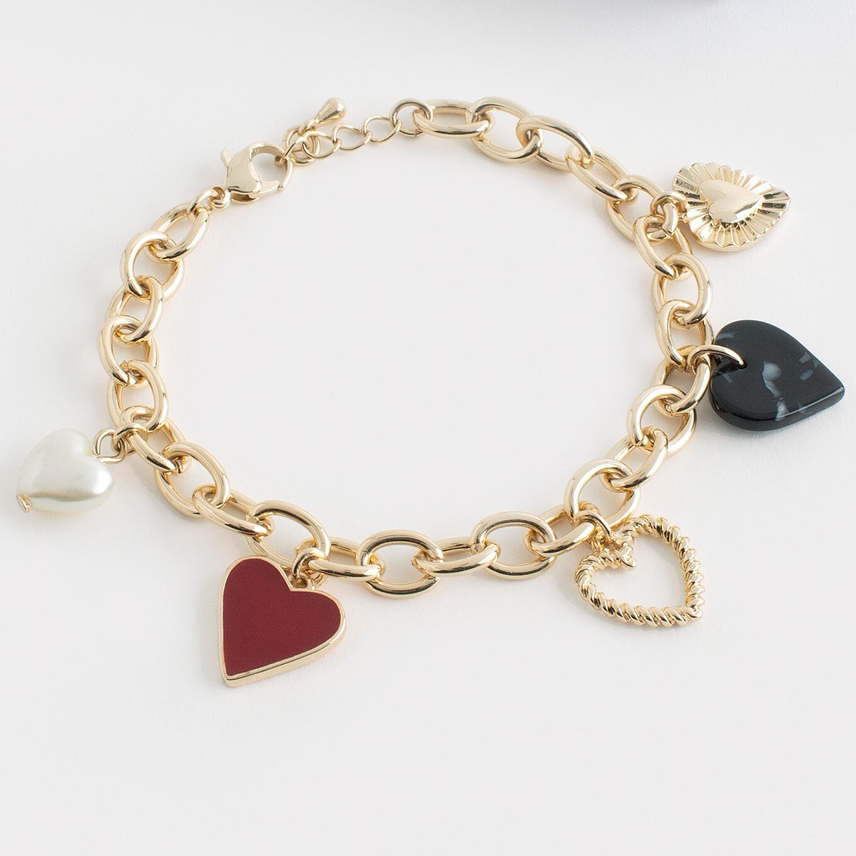 💜 Start dropping those Valentines Day hints today! 💜
This new gold-tone charm bracelet with faux-pearl accents would make a wonderful addition to any outfit! 
 
wu.to/bUxrsU 

#CharmBracelet #Bracelet #Jewellery