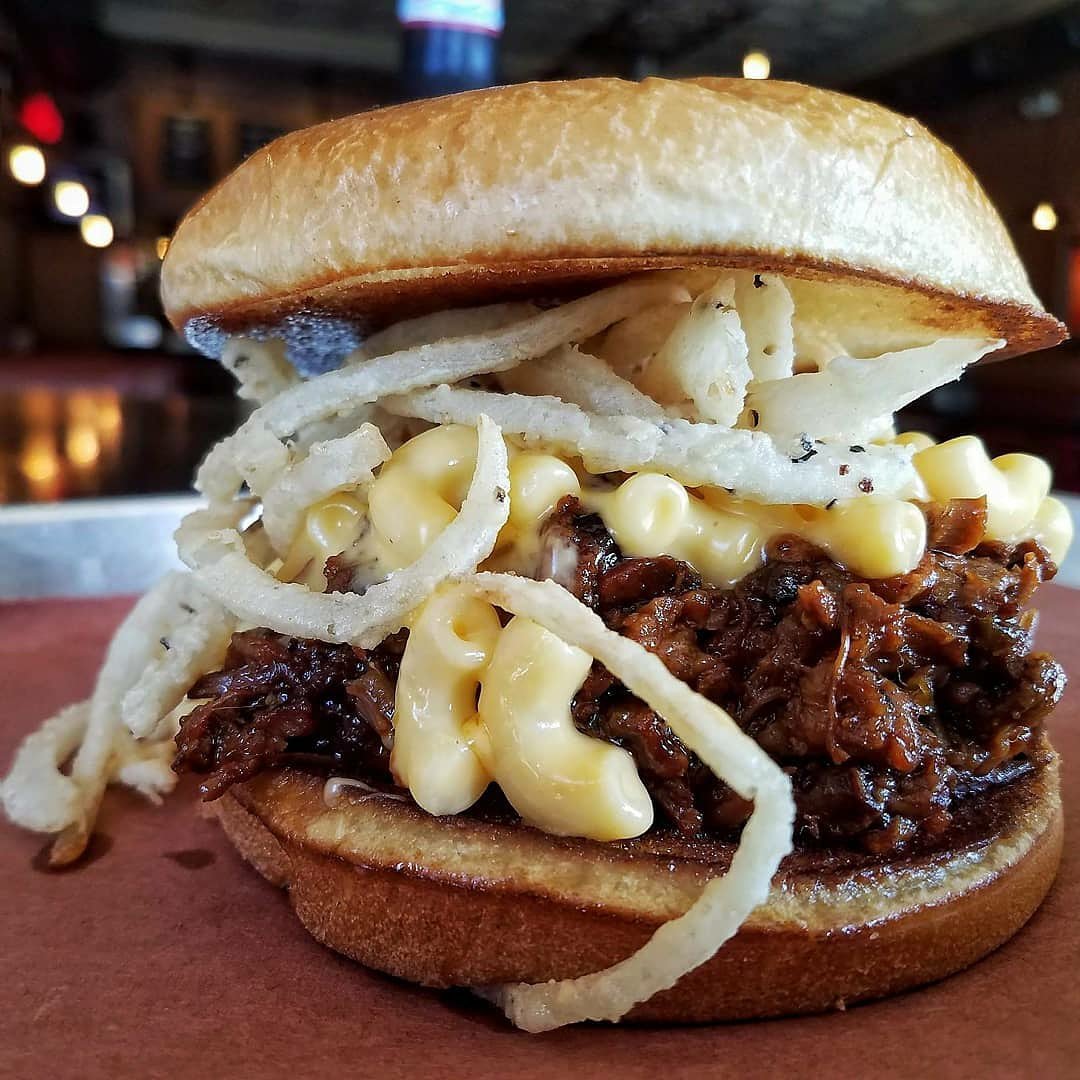 Happy Monday! Today's beastwich is chopped brisket, mac and cheese, and fried onions &amp; jalapeños on a brioche bun!