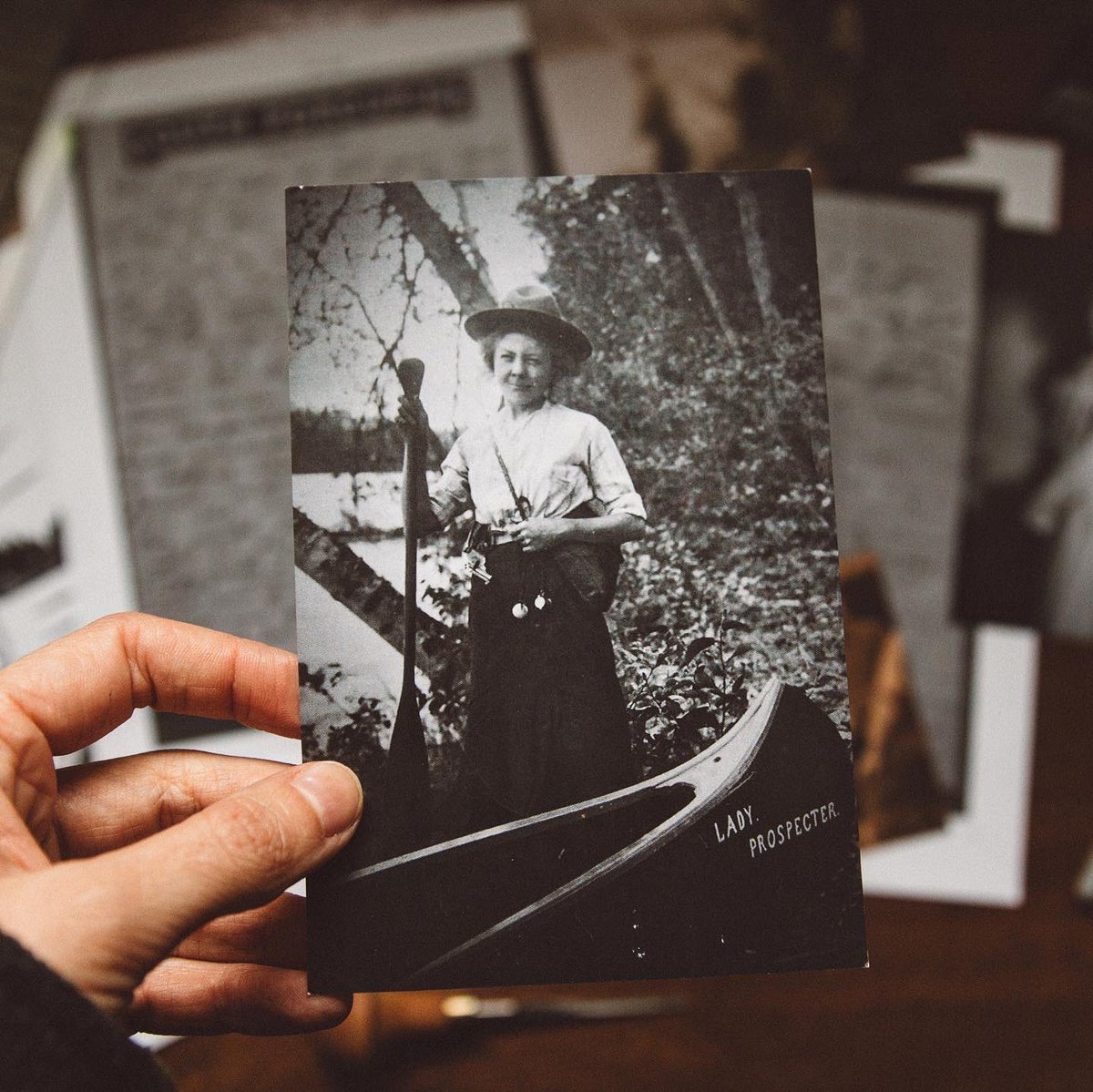 This was the photo that started it all. Porcupine’s Lady Prospector in 1910 standing next to her canoe, gun on her hip &amp; a slight smirk on her face. A woman of mystery, but clearly the main character. #WWBT