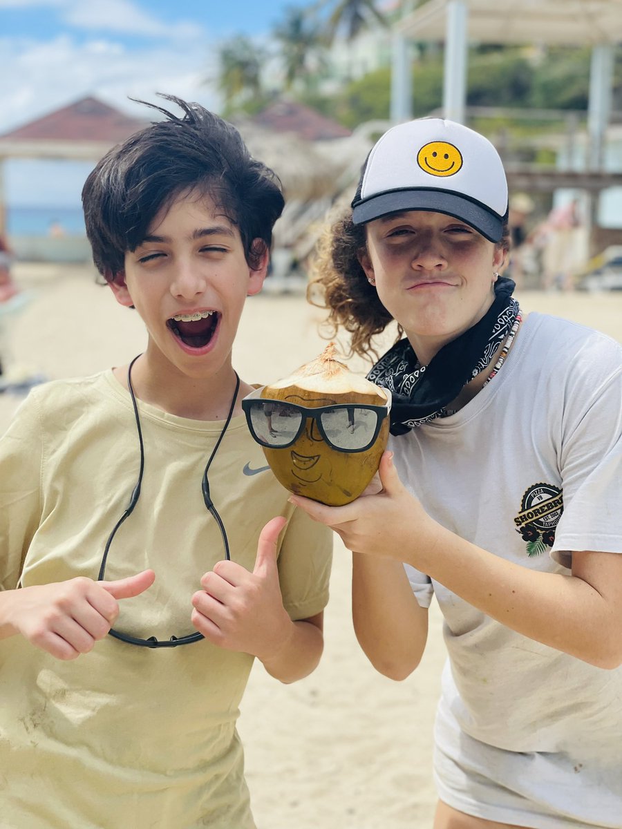 CHCNexus's tweet photo. Fresh coconuts on the beach! After a challenging hike, we enjoyed lunch together and then stepped over to the beach. One of our adventurers said drinking a coconut on the beach in the Caribbean was a bucket list item, so we couldn’t pass up this opportunity! #chcCuracao22 https://t.co/i1WWwKwG73