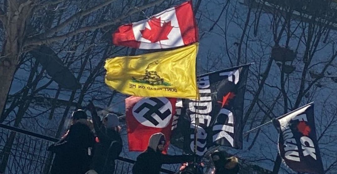 AntiTrumpCanada's tweet photo. The trucker rally is still going on in Ottawa. We now have idiots waving Nazi &amp; Confederate flags
 
I’m holding Donald Trump &amp; MAGA directly responsible for this vermin creeping into Canada. https://t.co/M9hIwnzgrt