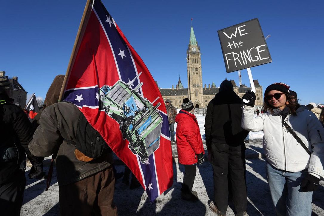 AntiTrumpCanada's tweet photo. The trucker rally is still going on in Ottawa. We now have idiots waving Nazi &amp; Confederate flags
 
I’m holding Donald Trump &amp; MAGA directly responsible for this vermin creeping into Canada. https://t.co/M9hIwnzgrt