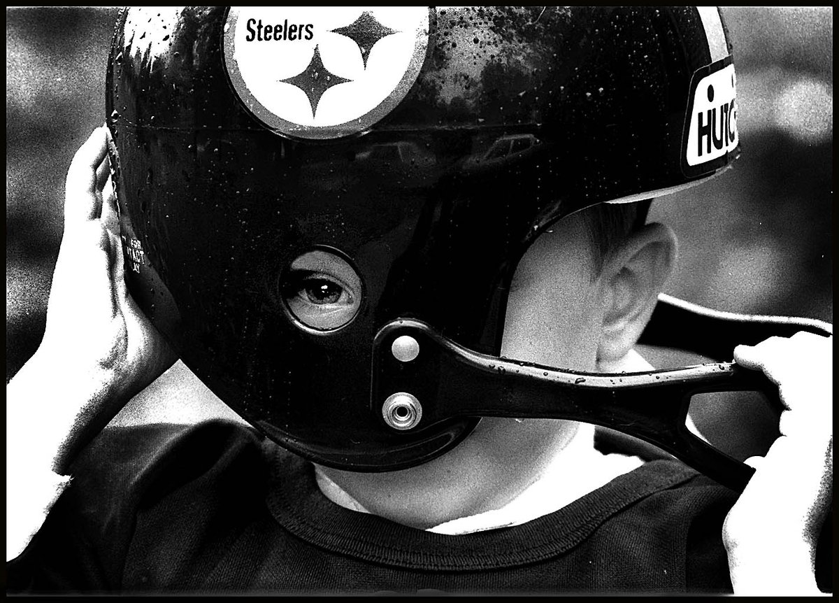 bilbowden's tweet image. Should QBs retire before their helmet is knocked sideways? This photo was taken years ago, probably when Ben Roethlisberger was just beginning his stellar career with Pittsburgh.  Is Tom Brady, maybe the Greatest Of All Time (GOAT) not far behind? @NFL @steelers