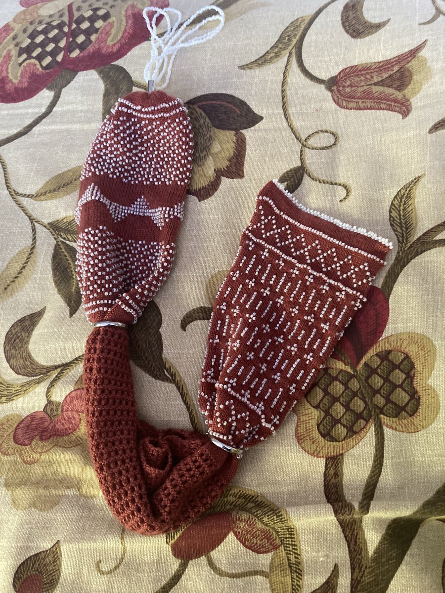 I finished my miser’s purse!! I had hoped to do a mesh edging on the square portion, but I think the picots look nice too. I’ll be finding beads in my couch for weeks…