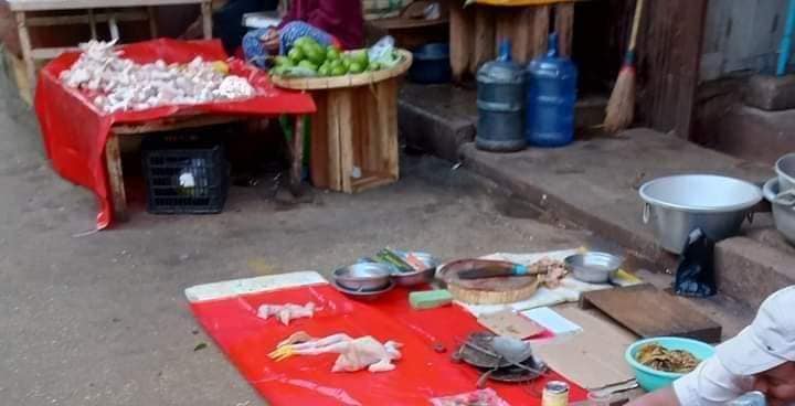 TheChindwin's tweet photo. In efforts to disrupt the people’s Silent Strike, Myanmar military junta has forced few individuals to sell in the street market with no buyers seen in the street. 
Photo – CJs https://t.co/tb0vqhKTzW