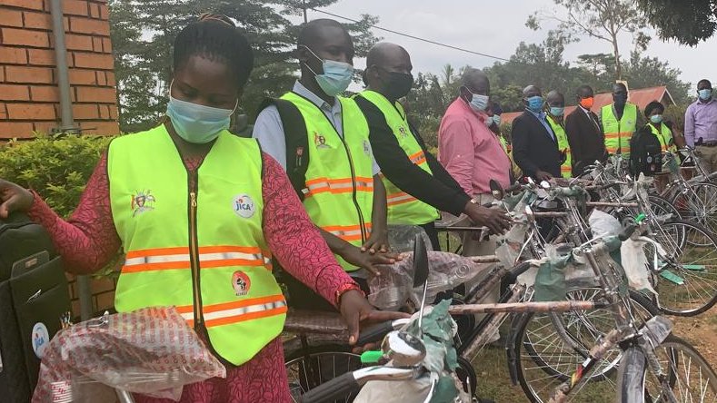 ACHEST1's tweet photo. #CommunityEngagementStrategy:Yesterday we met some of the Village Health Teams #VHTs &amp; leaders in Mukono District to assess the progress of the #CESproject. We also handed over additional tool kits including bicycles to ease the VHTs' work as they move household to household https://t.co/rpIBS0BkUu