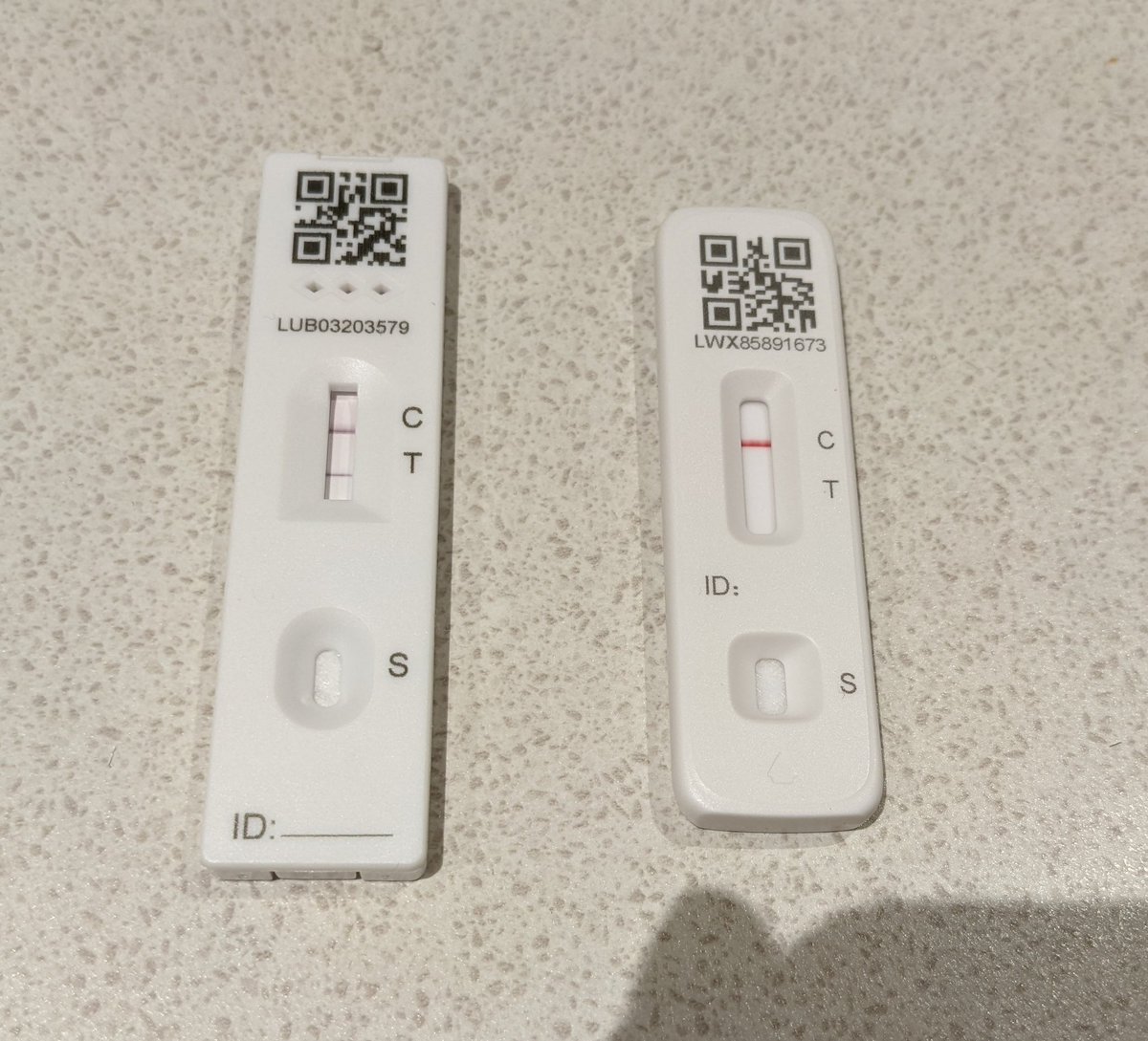 So, at 4am I woke up feeling rough. Came downstairs took paracetamol and did the test on the left (a throat and nose one). At half 6 I did another (just nose) and it's negative!?!?! Anyone else experienced this issue? https://t.co/nkN1YhG3qQ