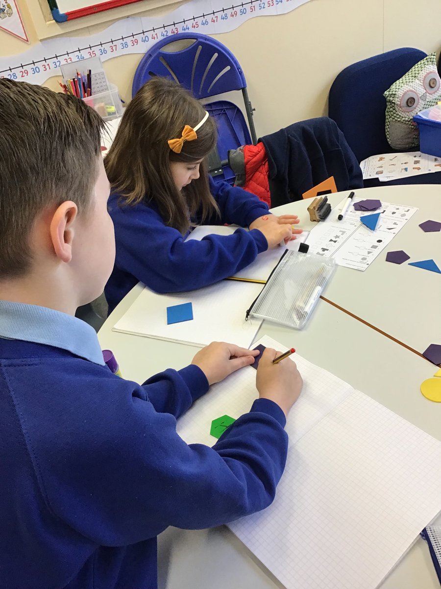 StColumbasCPS's tweet photo. Children working hard with Mrs Thomas in maths this morning #2Dshapes #vertices #sides #makeyourownpattern ⁦@bcw_cat⁩ https://t.co/JKP8KrxrvF
