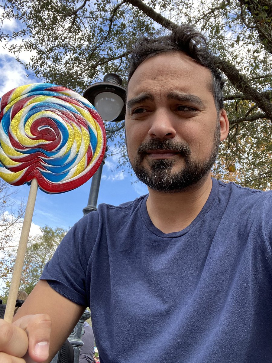 Guarding a lollipop at an amusement park and kids are staring at me like JACKALS.