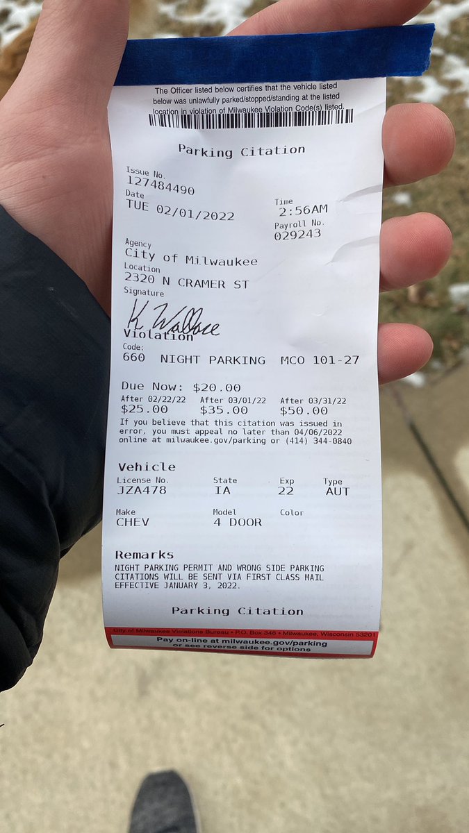 ReaganRies's tweet photo. can someone please explain what this ticket is for? Are we not allowed to park at night? @MilwaukeePolice @CityofMKE https://t.co/Fd5Twn8rVH