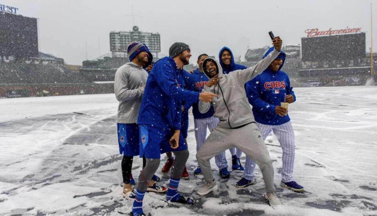 BleacherNation's tweet photo. With serious snow on the way, I'm reminded of the Cubs' Snow Day at Wrigley Field in 2018, when they had to postpone the home opener. Simpler times. https://t.co/KdkkR11cq7