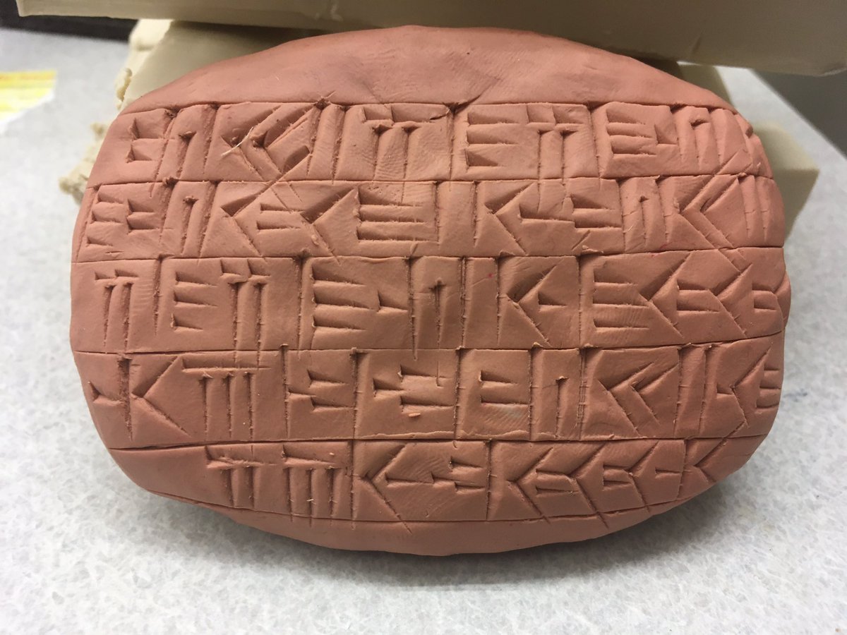 botts_jeremy's tweet photo. We taught about cuneiform in last night’s Technotexts class. I cut wedged styluses for everyone and gave them plasticine. We’re continuing to explore how form often comes naturally from available materials. This was my demonstration. #cuneiform #technotext #artatwheaton https://t.co/Qnpkl20Bvj