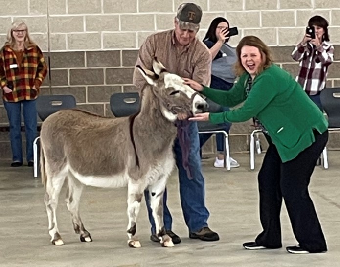 BurnetCISD's tweet photo. On this Groundhog Day, Pawnee the Donkey visited Bertram Elementary. Pawnee chose oats to eat, which represents a prediction of an early spring! As part of a student incentive, Principal Harris gave Pawnee a BIG, wet kiss! https://t.co/w4cw9WVuhI