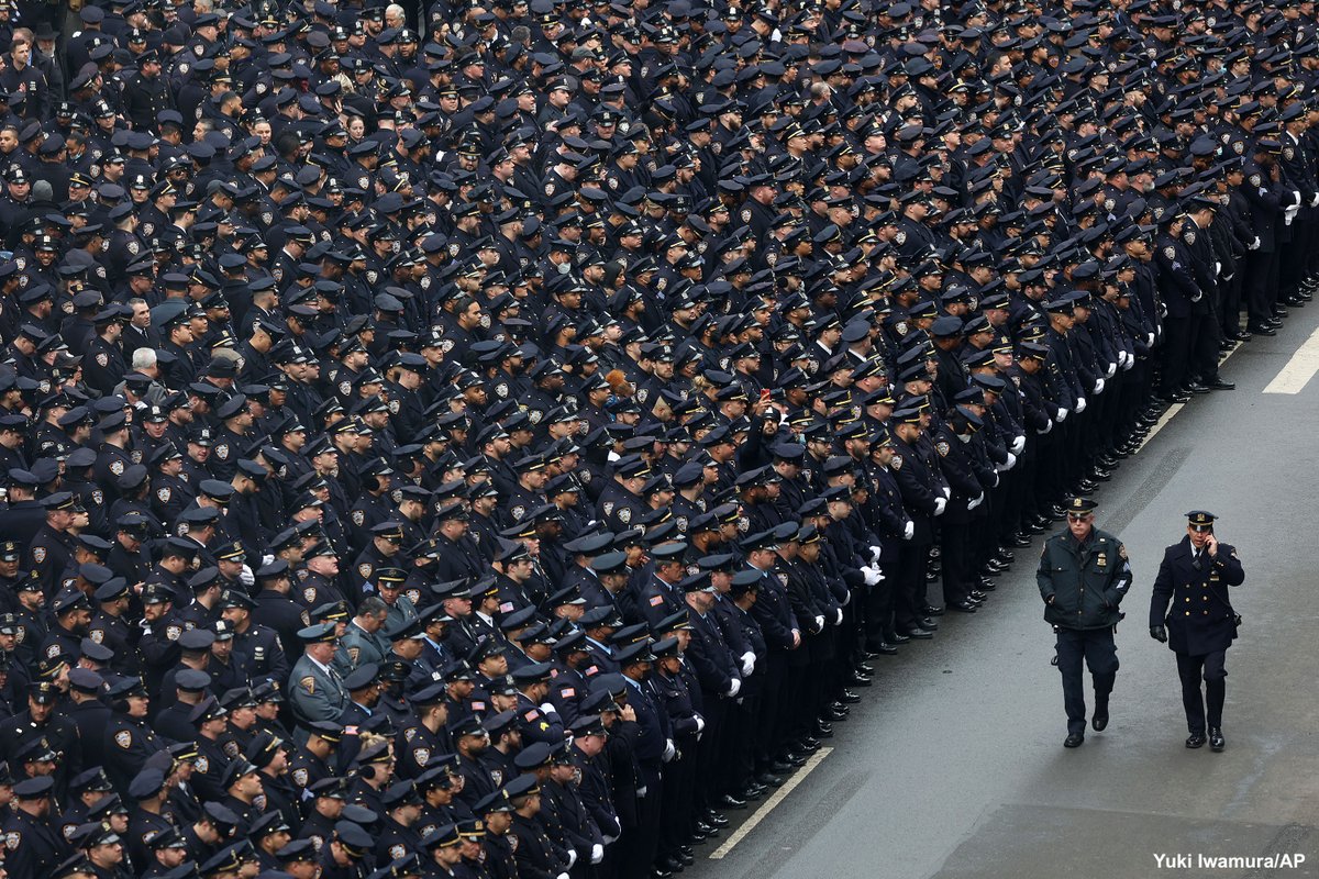 ABC's tweet photo. SEA OF BLUE: Throngs of police converged for New York City's second funeral in a week for an officer ambushed while answering a call for help in Harlem.

Police Commissioner Keechant Sewell called Wilbert Mora “three times a hero.” https://t.co/OCgsoyk50Z https://t.co/qhShFUPtO0