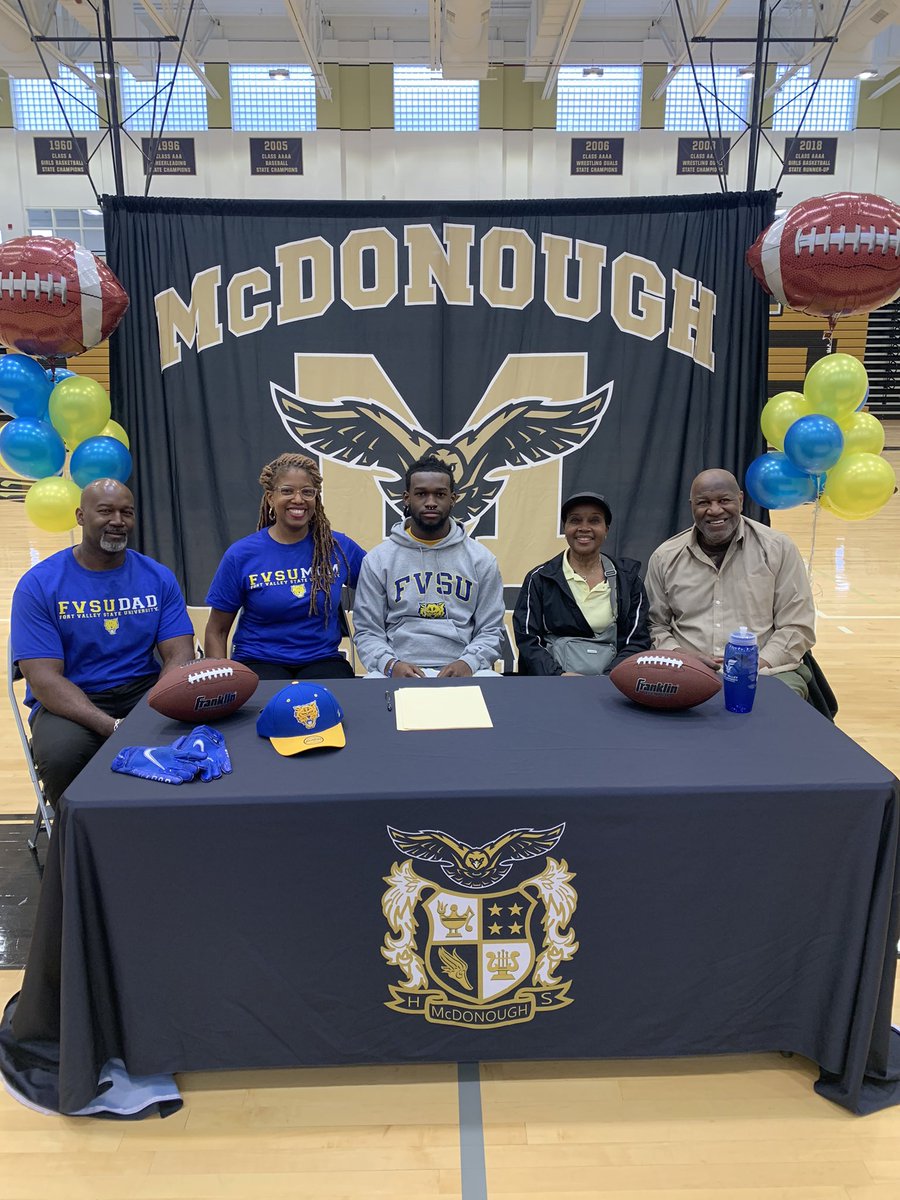 McDonoughHS_AD's tweet photo. McDonough High School celebrating Richard Baugh’s signing his National Letter of Intent to Fort Valley State University. Another WarHawk Flying High!!! @AntonioMattox2 @McDonoughHoops @Rhodes2EDU @CoachMikalUwood @JulissaForbes @AthleticsHenry https://t.co/lJxuREJXZl