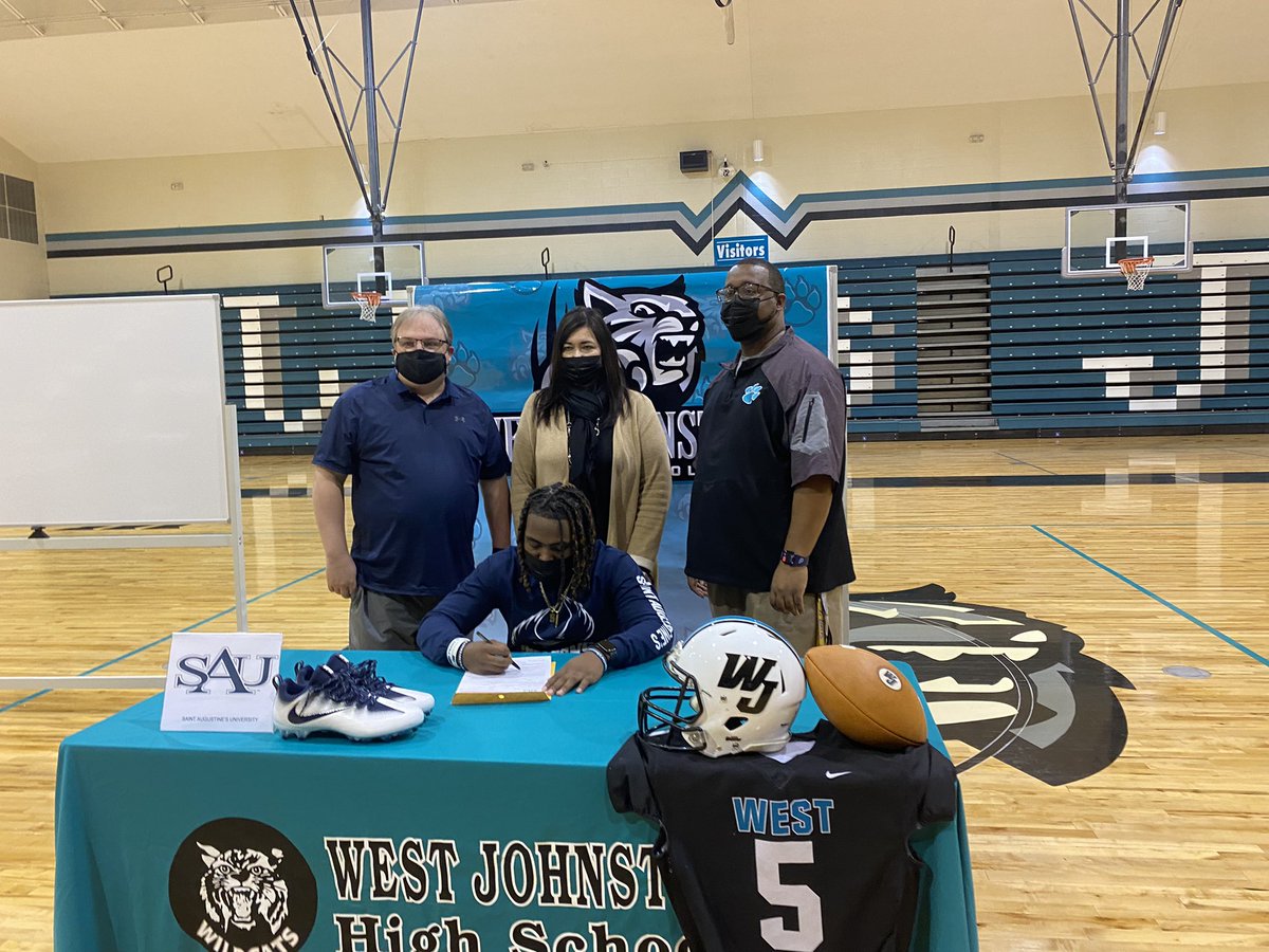CoachHarp_WJ's tweet photo. This one hit a little different today when your own has the opportunity to sign. Congratulations to @DonteHarper6 for signing with St. Augustine. I’m proud of you and love you. We will have more to sign in the upcoming future here at West Johnston! @CoachBowser2 https://t.co/OefwInlCW2