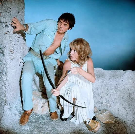 BandamlakYimenu's tweet photo. Monica Vitti &amp; Terence Stamp in Modesty Blaise. This movie is mostly camp but these two are my favorite actors of that era and seeing them together makes so much sense. https://t.co/fhKE3tLgyu