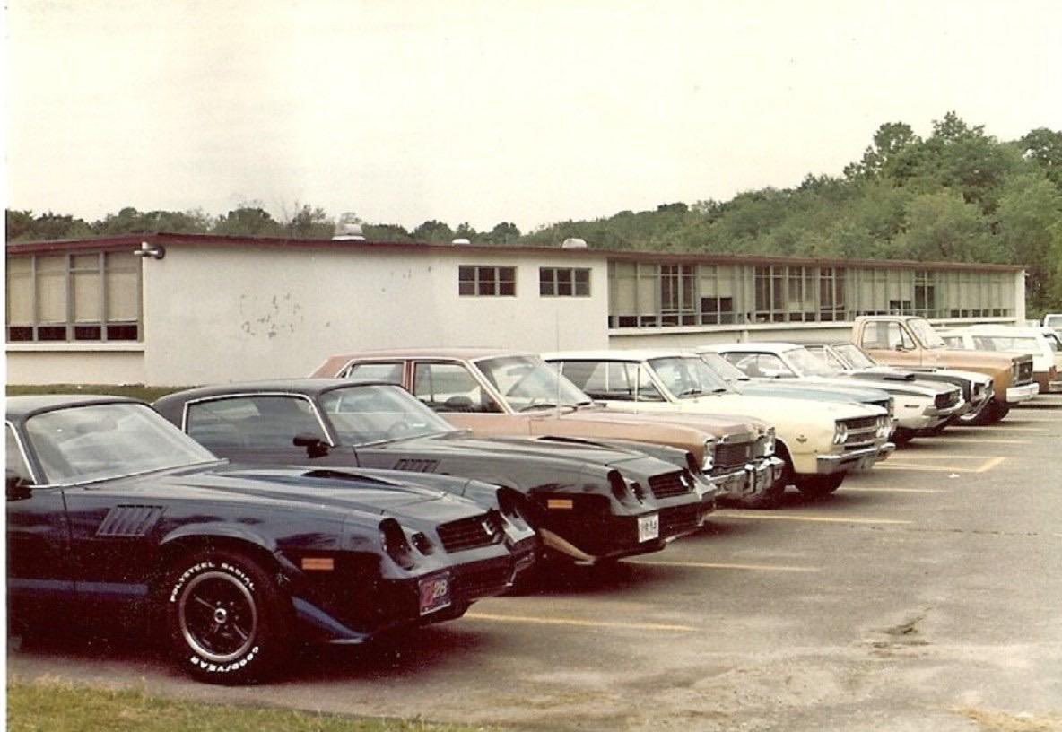 There’s no parking lot like an 80s high school parking lot. You know some of those sweet rides will be cruising town after the football game Friday night.