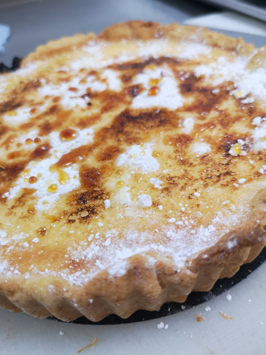 Lemon tart served with a mint whipped cream, for evening tea