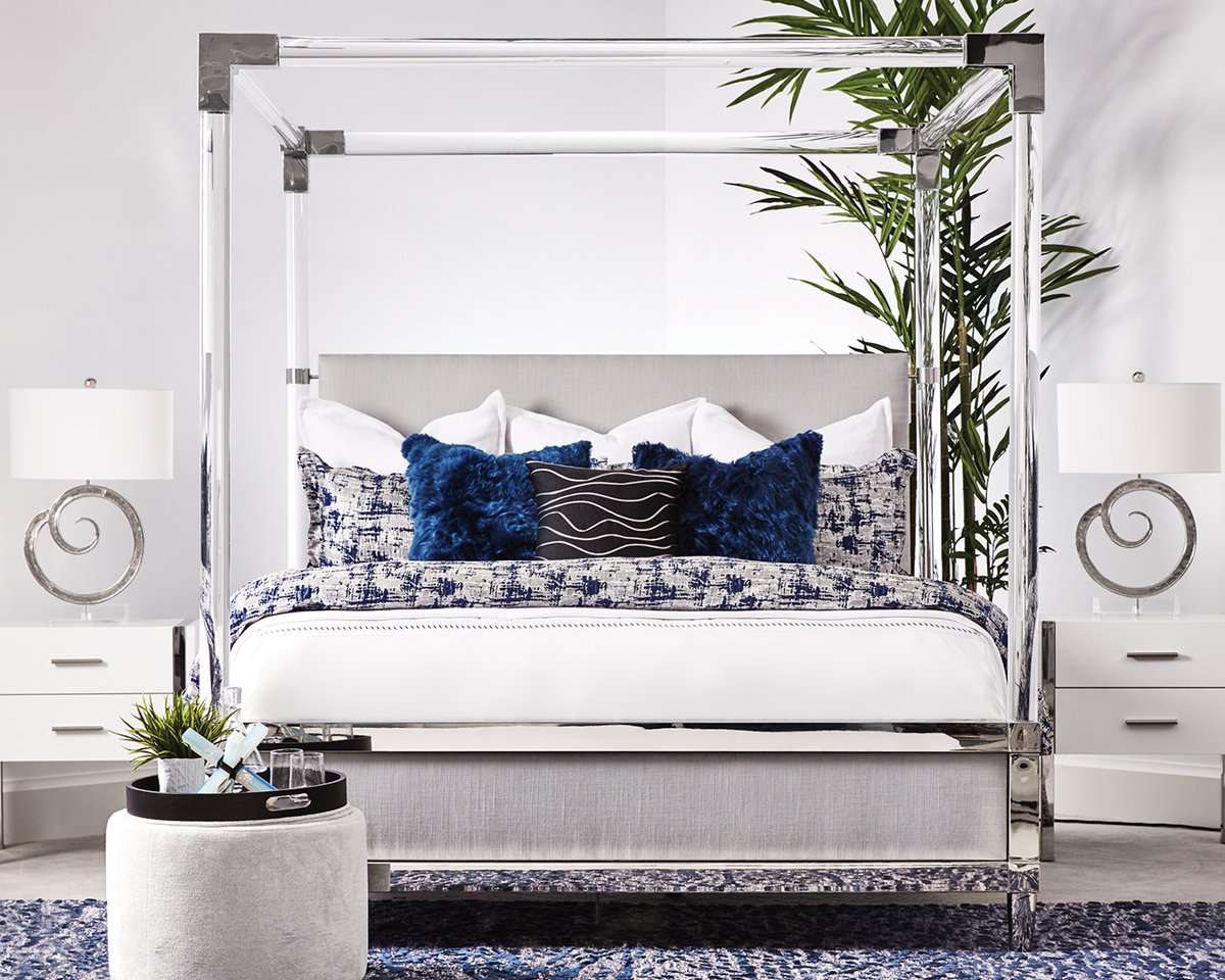 The Rayleigh Bed's acrylic canopy accented with metal connectors creates a sleek, ultra-modern aesthetic, while a neatly-upholstered headboard & footboard soften the look. ____________________________ #robbstucky #interiordesign #furniture #floridahome