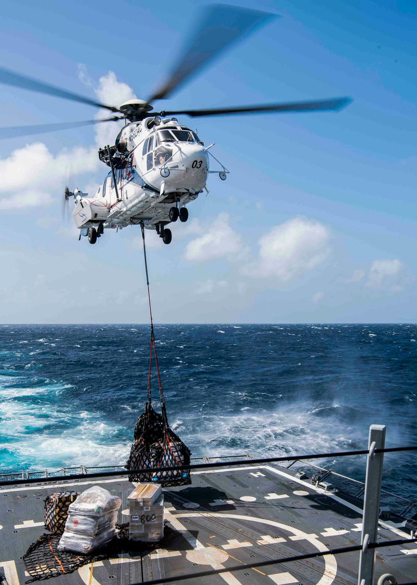 USPACOM's tweet photo. A S332 Super Puma helicopter assigned to the Military Sealift Command fleet replenishment oiler #USNSMatthewPerry conducts a vertical replenishment-at-sea with the Arleigh Burke-class guided-missile destroyer #USSGridley.
#FreeAndOpenIndoPacific #Readiness #SouthChinaSea https://t.co/Izqu5dvo7N