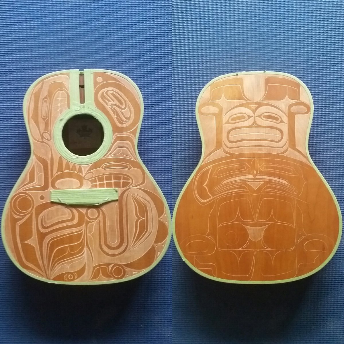 DOC604's tweet photo. Today's #acousticguitar #carving update : the #guitar #sprucetop is pretty much done but the #maple #laminate back is taking a bit longer BUT is teaching me a lot. Its almost time for some new #carvingTools. #NativeDesign #FirstNations #traditionalart #Formline #acoustic #guitar https://t.co/z8TgC49Xfq
