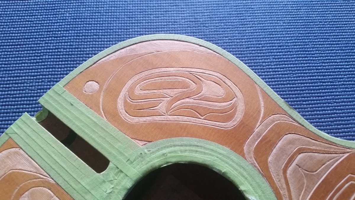 DOC604's tweet photo. Today's #acousticguitar #carving update : the #guitar #sprucetop is pretty much done but the #maple #laminate back is taking a bit longer BUT is teaching me a lot. Its almost time for some new #carvingTools. #NativeDesign #FirstNations #traditionalart #Formline #acoustic #guitar https://t.co/z8TgC49Xfq