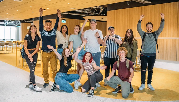 A group of students cheering