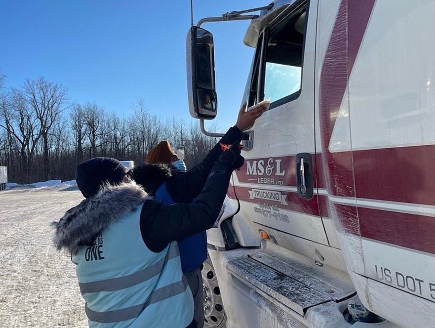 KhalsaAidUSA's tweet photo. On Sunday January 30th 2022, team #Montreal from @khalsaaidca went to different truck rest stations near the American border. Volunteers distributed Pizza and snacks to thank all the cross-border drivers for their valiant efforts for this winter.

#khalsaaid https://t.co/vtcozyMILx