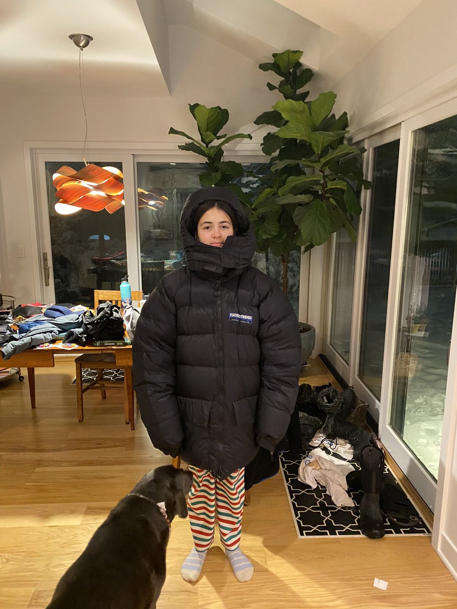 Told my daughter to take our trash cans out to the curb tonight in the midst of our ongoing snowpocalypse. Somewhere in the house she found our Tibetan field jackets. 😂😂😂