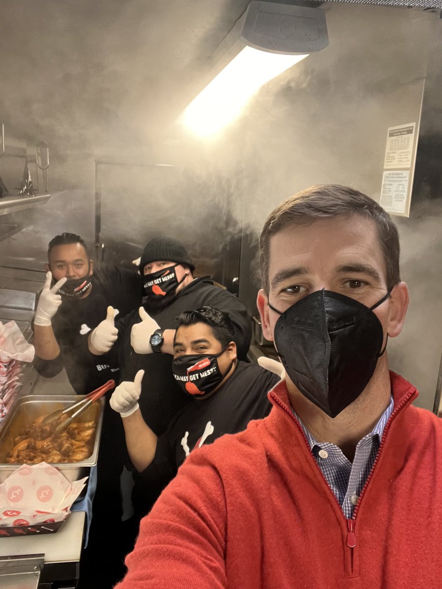 EliManning's tweet photo. I don’t think I’ll ever get the smell of wings out of my clothes, but what a fun time today in the truck. Thanks to this great crew for showing me the ropes. https://t.co/fRkezv1OaM
