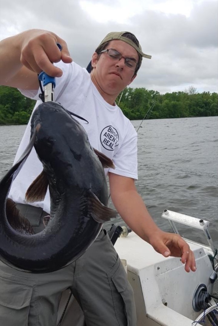 Paul_the_3rd's tweet photo. Hello! My name is Paul, I'm from New York State, the attached pictures encompass who I am very well. I spend a lot of time standing in barns and getting harassed by catfish. Other than that, I enjoy clock making, stamp carving and collecting other obsolete skills. #nifkin https://t.co/N9QQcN4YxT