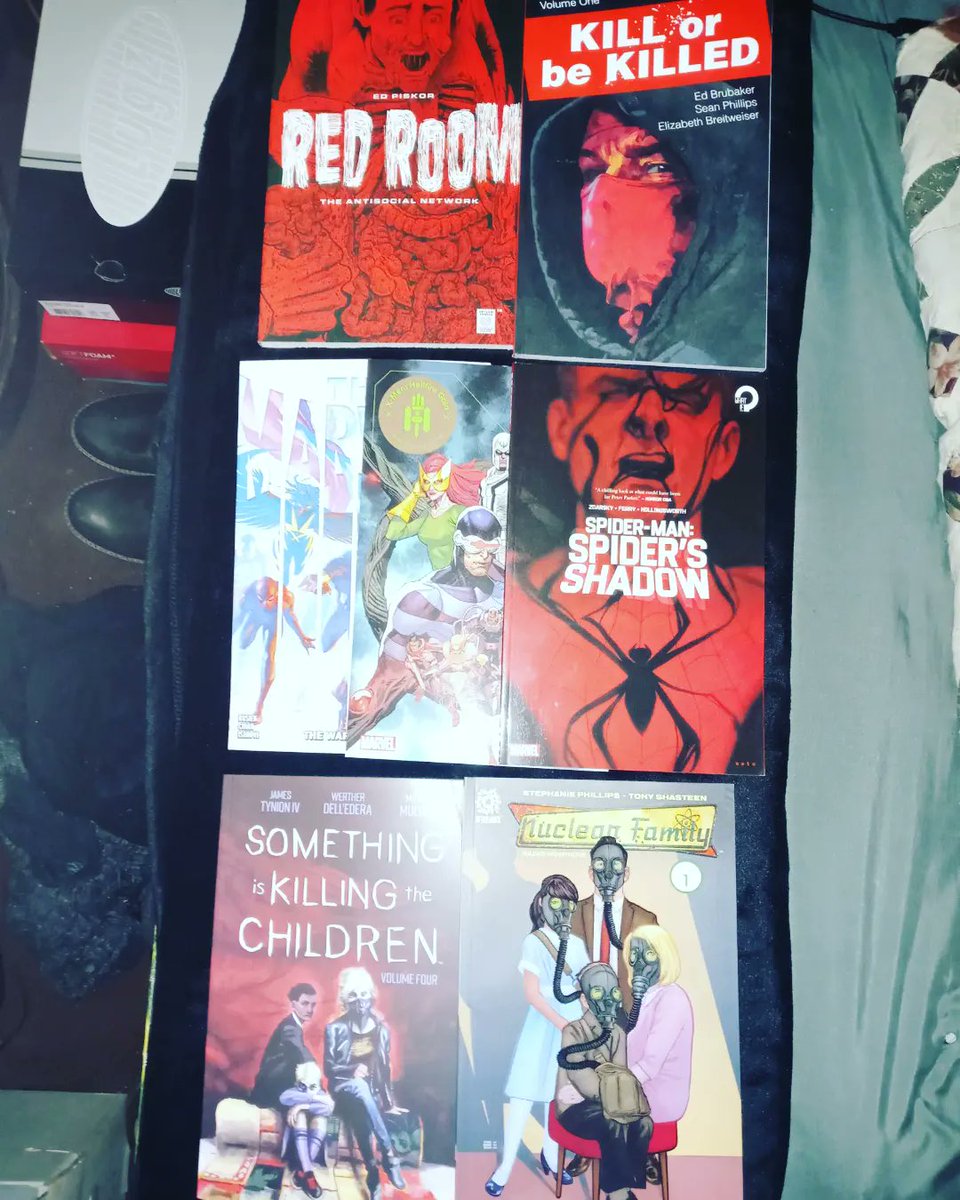 devastation79's tweet photo. @ProfessorFrenzy 

grabbed a bunch of new soft cover tpbs/graphics today..still need stop at comic shop for the week after I tattoo tomorrow n make a few bucks..check em out..if you haven't read #NuclearFamily I highly recommend it! Have a great night man!(#spidersshadow as well) https://t.co/SP7ACJEQXl