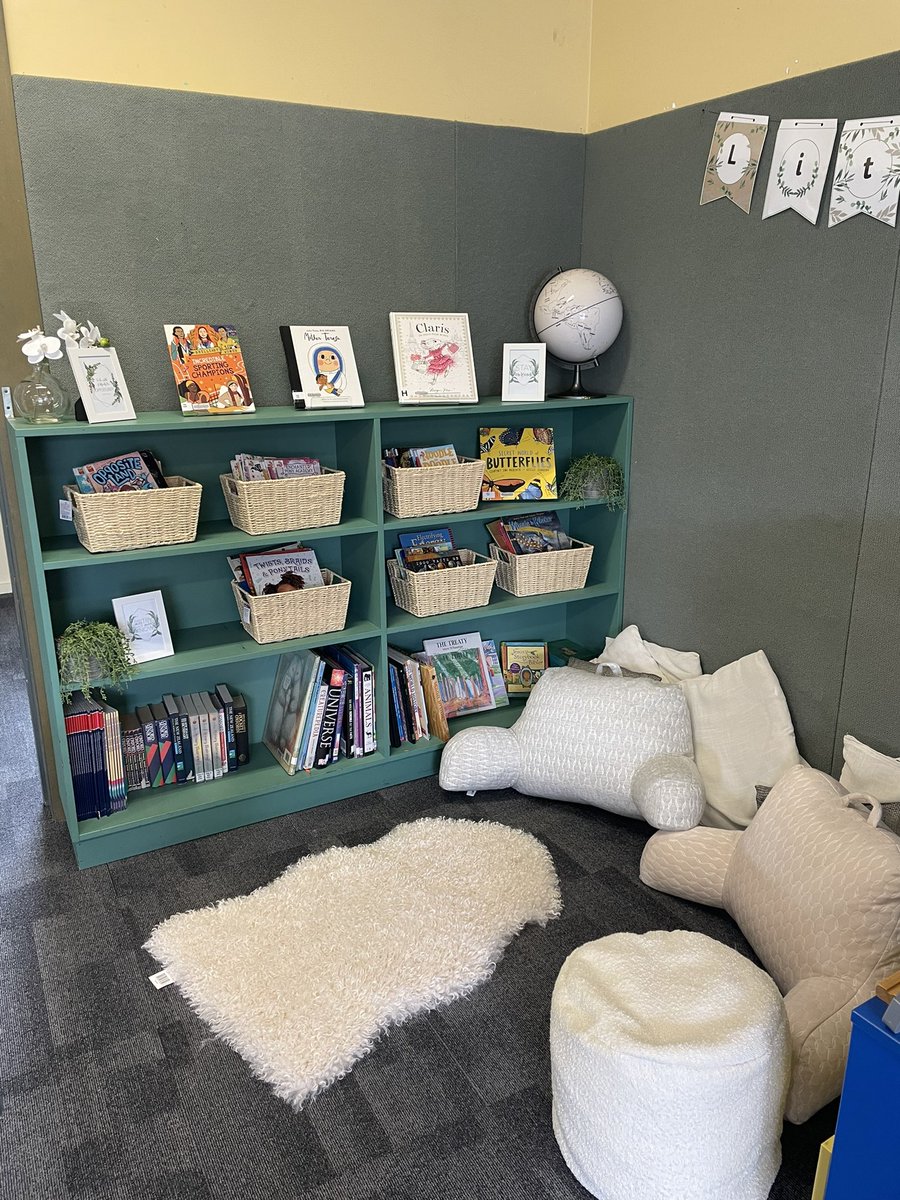Getting there… covered the cushions, added some new cosy bits &amp; brightened with baskets/plants… and of course some books! Just waiting on the book review display work next but a much more inviting space 🤍📚