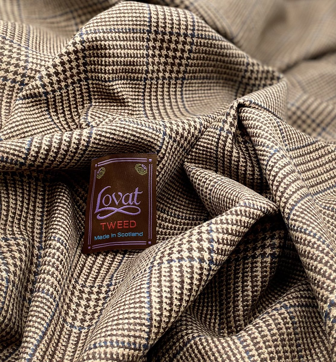 KabbaniTextiles's tweet photo. From the superb Lovat we have a stunning Prince of Wales piece in a soft brown with a blue overcheck. Proudly #madeinscotland using the finest woollen spun yarn, giving you a light but robust #tweed find me at https://t.co/fM2N4tEVEn #wool #jacketing #patchwork #cushions https://t.co/JjBhni8Esr