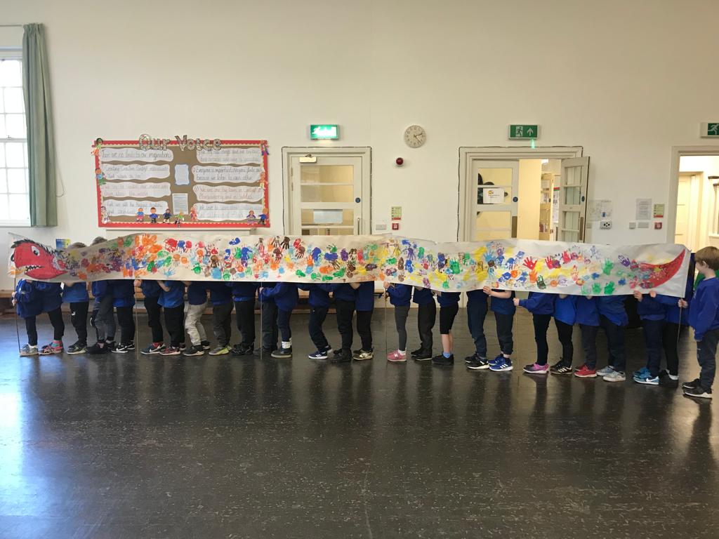 CantrefPrimary's tweet photo. Today reception watched a film about the dragon parade for Chinese New Year, so we decided to make our own. We made up dances and took it on a parade of the school. We scared Mr Brunsdon and he ran away! #ethicallyinformedcitizens #cultureawareness @MonmouthshireCC https://t.co/ABbVDAUjQu