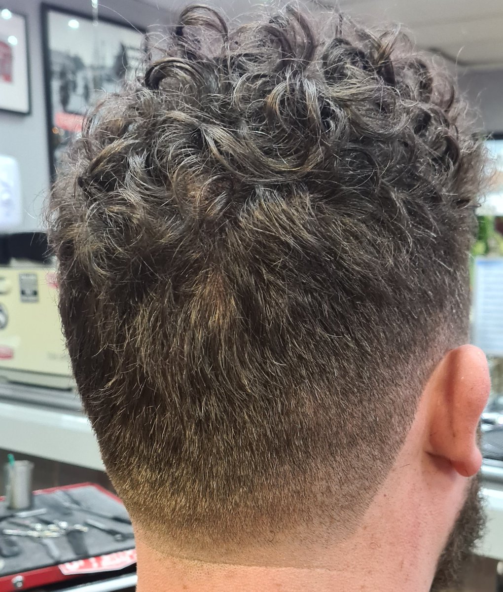 Tapered into curls on top 💈