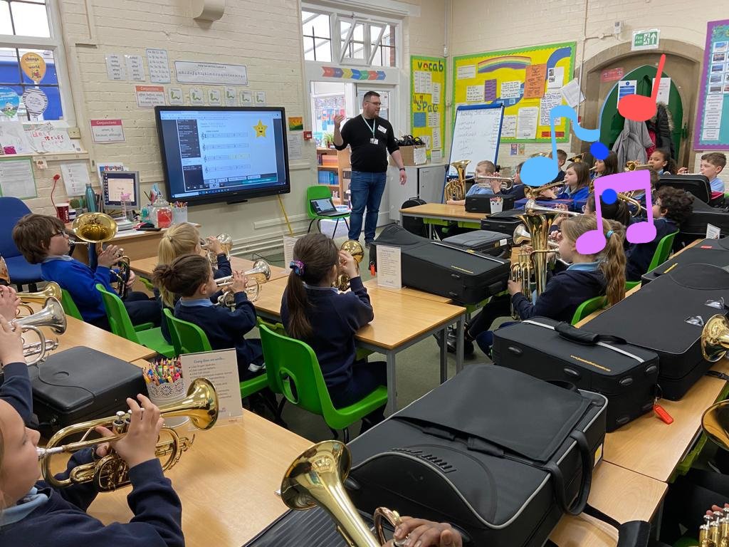 HagbourneSchool's tweet photo. Music making. Year 4 enjoying learning how to play either the cornet or the baritone horn. 🎺 https://t.co/XJ7jFjm5Tx