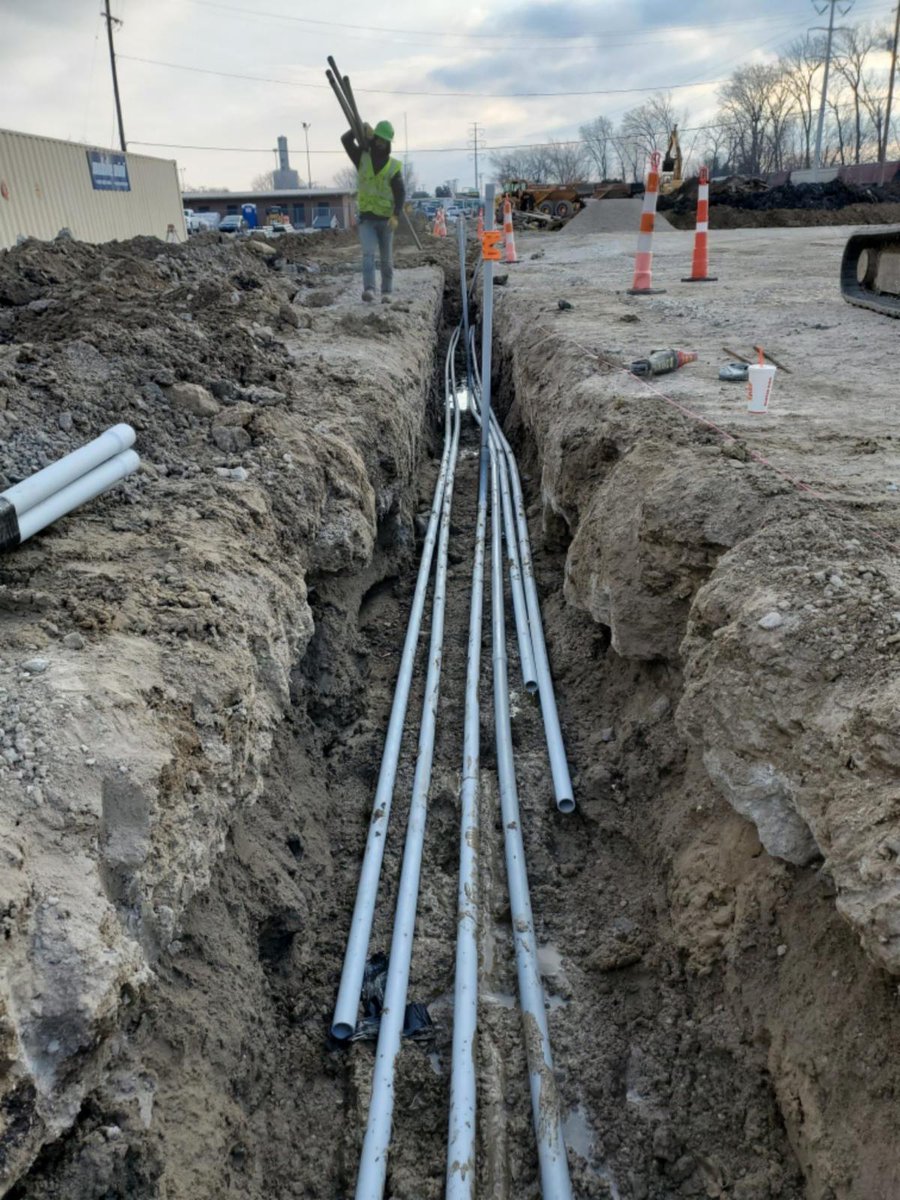 BruceMerrilees's tweet photo. B&amp;M's construction team is fighting the cold to install block heaters for Estes Express Lines. Our team is running conduit for a parking lot full of block heater posts. When the project is complete, Estes' trucks can keep their engines warm even when the temperatures drop. https://t.co/zD53RS0tu1