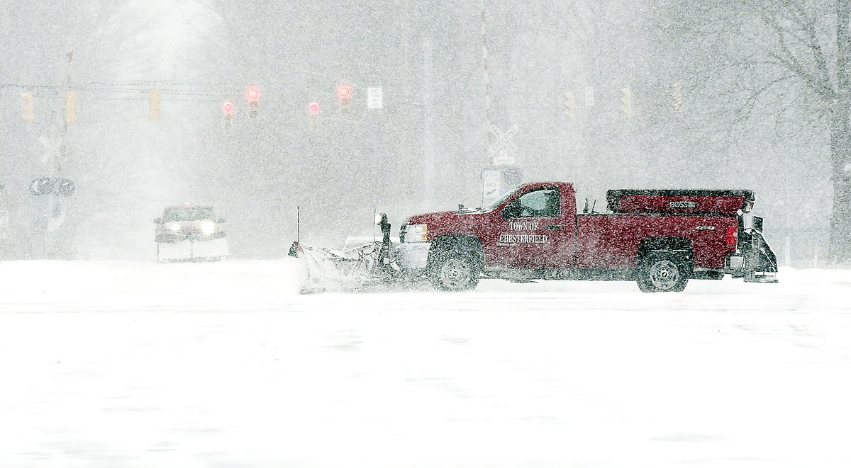 Chesterfield plows were out trying to keep up with the blowing and drifting snow Thursday morning, here plowing County Road 67 and 500 East intersection.