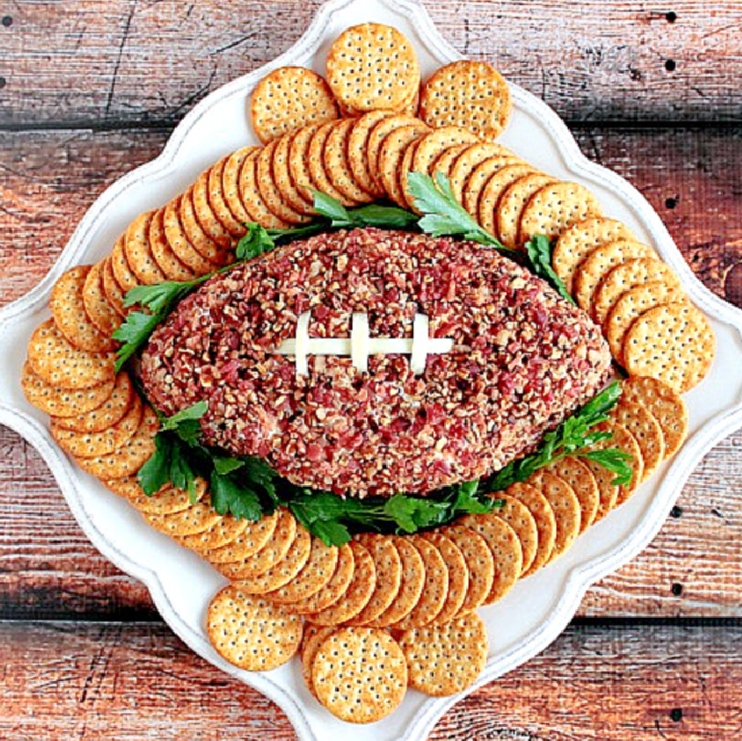 When it's time for the big game, win big by serving this delicious Football Shaped Cheeseball with Pecans. Victory never tasted so good! #appetizer #cheeseball #superbowlfood #footballfood kudoskitchenbyrenee.com/football-shape…