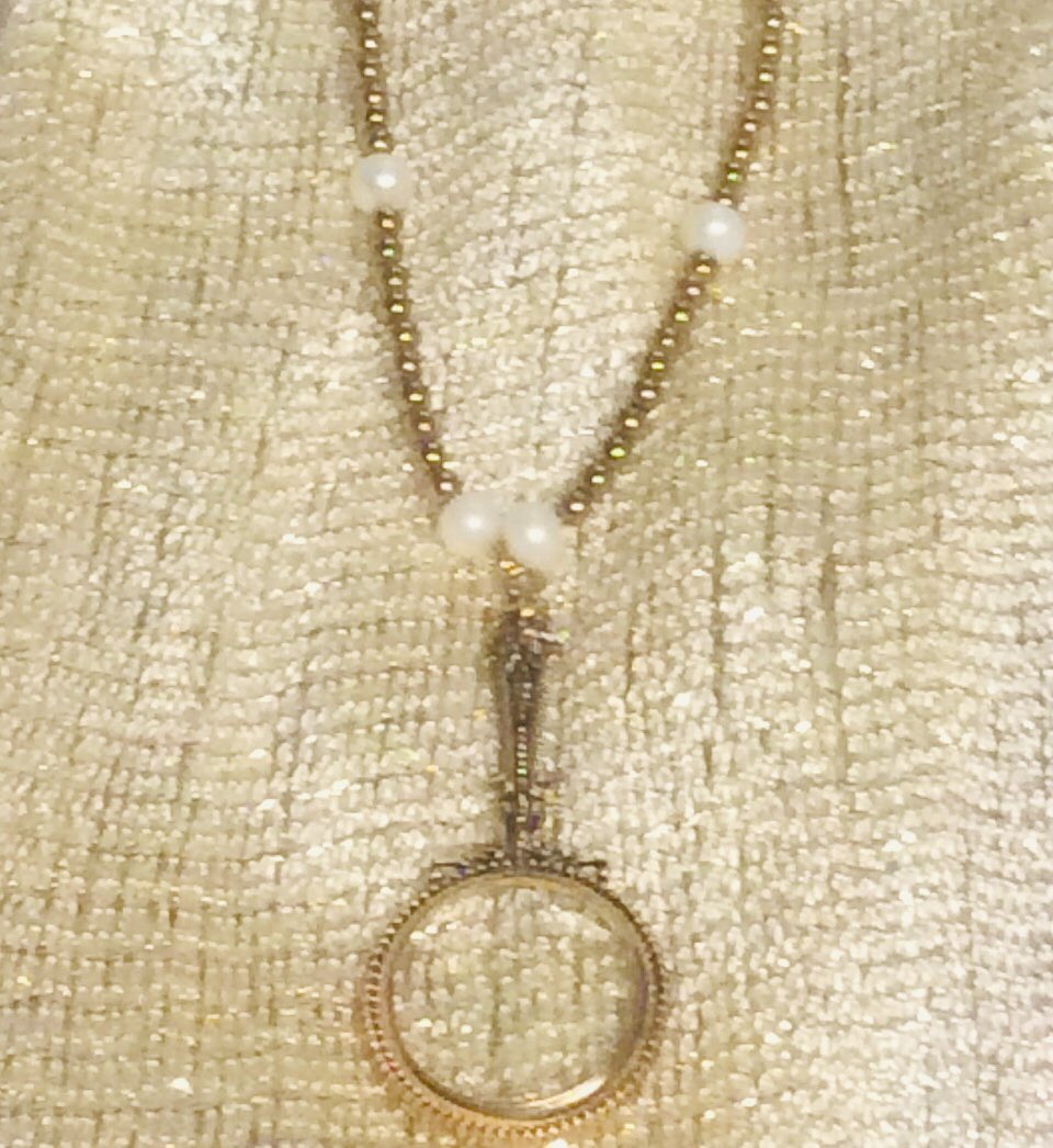This magnifying glass necklace was a request for a customer and is made from Genuine Gold Hematite Gemstones and Fresh Water Pearls! Follow Rivers of Blessings Jewelry and Gifts on Instagram and Twitter!