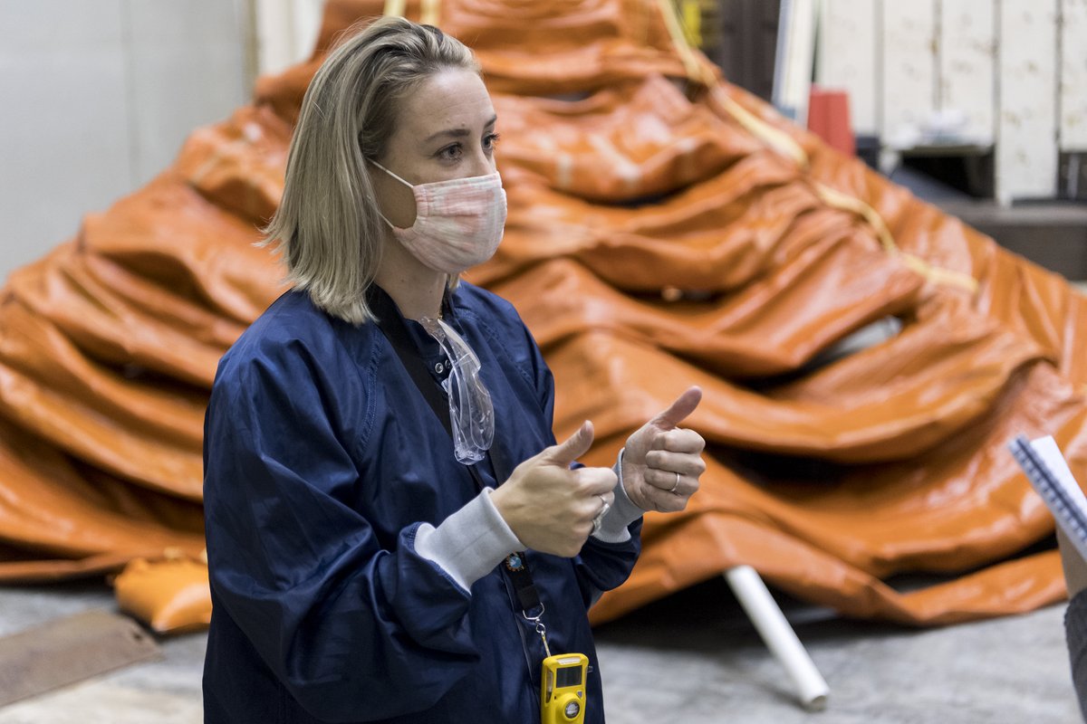 Aerospace engineer and inflation system lead Hillary Blakely gives a thumbs up to the LOFTID inflation system test at NASA's Langley Research Center.