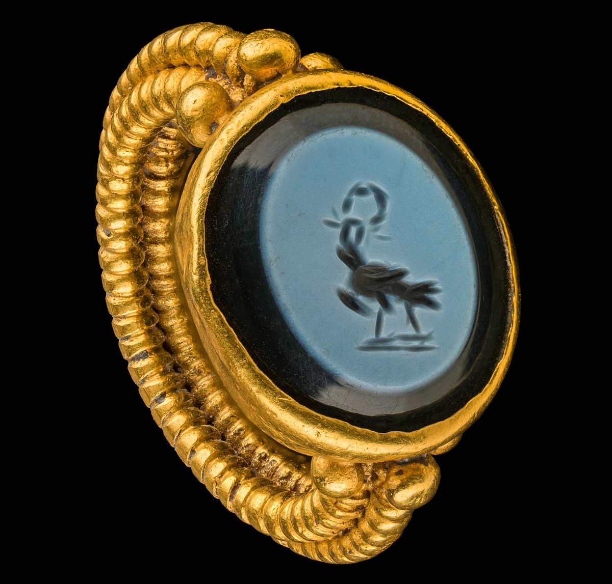 A magnificent gold ring with intaglio gem depicting an eagle holding a laurel victory crown in its beak. The ring was discovered in a Roman-era shipwreck in the eastern port (Portus Magnus) of Alexandria, Egypt. 30 BC - 100 AD. Bibliotheca Alexandrina