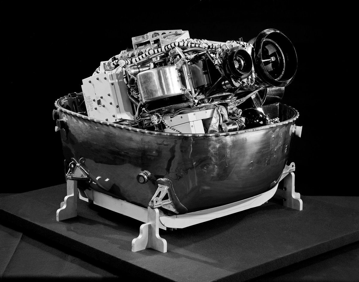 Black and white photo of the Lunar Orbiter camera system in the center