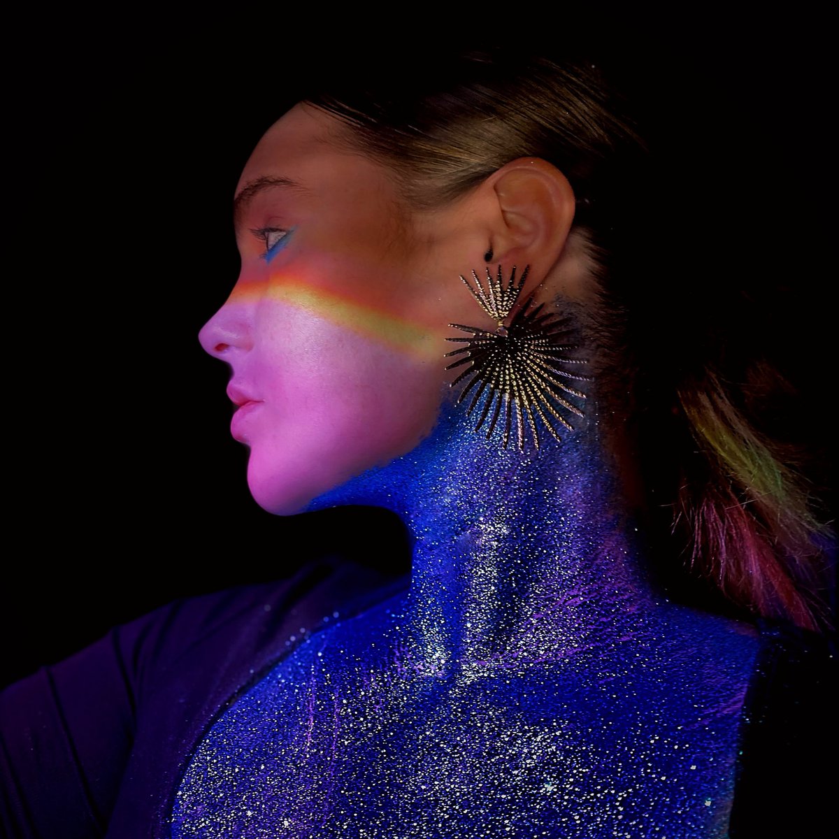 Juli had an assignment for her college class to photograph herself. Isn’t this so cool?  That’s makeup on her neck!