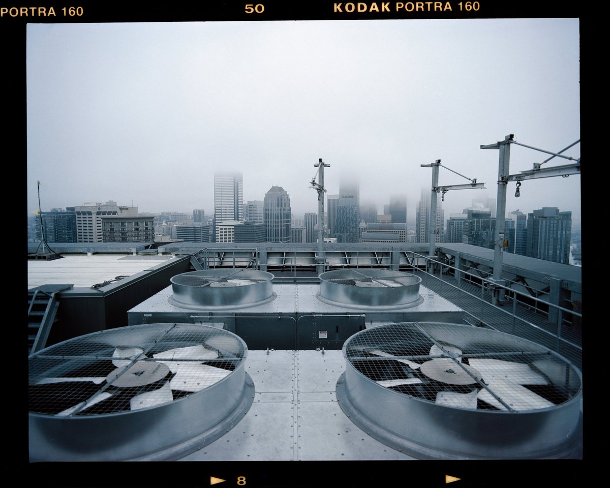 _dipsauce's tweet image. gm y'all. A few medium format frames from a roof I shot during Seattle's brief stint of fog. This was my first time shooting a roll of portra 160. I think I like it.