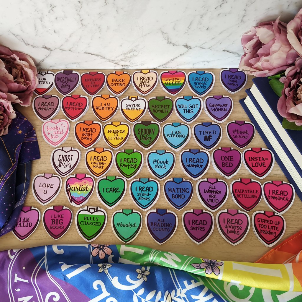 bookstattoostea's tweet photo. #InfluencerPost 
I love these magnetic candy heart bookmarks by @nerdteacreations. I have so many (these aren't even all of them) Check them out at https://t.co/Fuoxo9YtfZ and use the code BOOKS10 (on Etsy only) for a discount!! https://t.co/VAaWmwxuR5