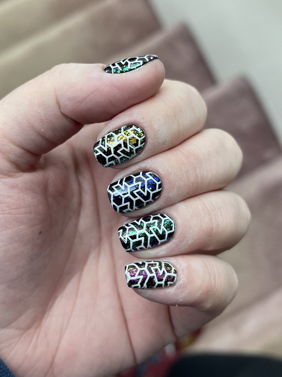 Bethsnailss's tweet photo. 1 yr + 15 weeks. Okay I think I might be obsessed with stamping.😆 It’s so fun and you can make so many cool things. I used #holotaco OCB with Unicorn Skins over top. And on the other hand is Blue Ain’t Slick. Both with Maniology’s Bam!White for stamping.💅🏼 @nailogical @holotaco https://t.co/cLHnFV5Tak