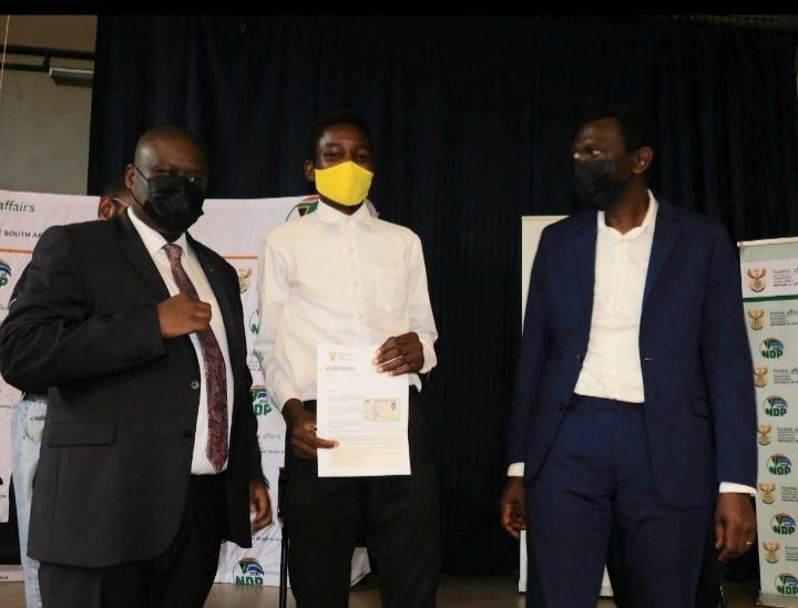 HomeAffairsSA's tweet photo. Deputy Minister hands out #smartIDcards and school uniform to learners. 30 learners received uniforms, 60 learners from disadvantaged homes received food vouchers, top 3 learners (Grade 10-12) from both Ntshingiswayo High School and Umbethe High School received Tablets, https://t.co/BQ3Zy2LYa1